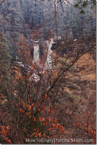 A peak at the frozen waterfalls at Community Caves from the road in Spearfish Canyon photo taken near highway 14A of Community Caves in Spearfish Canyon in the Black Hills National Forest