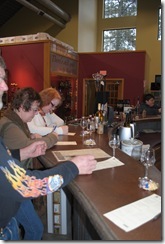 belly up for a free taste of up to five wines phots wine tasting at Prairie Berry Winery