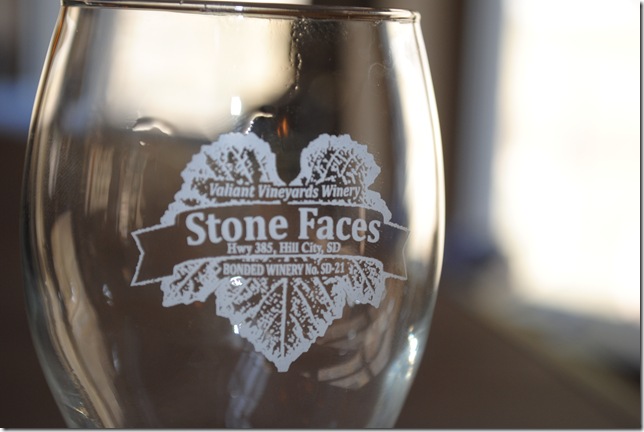 photo of a wine glass at Stone Faces Winery